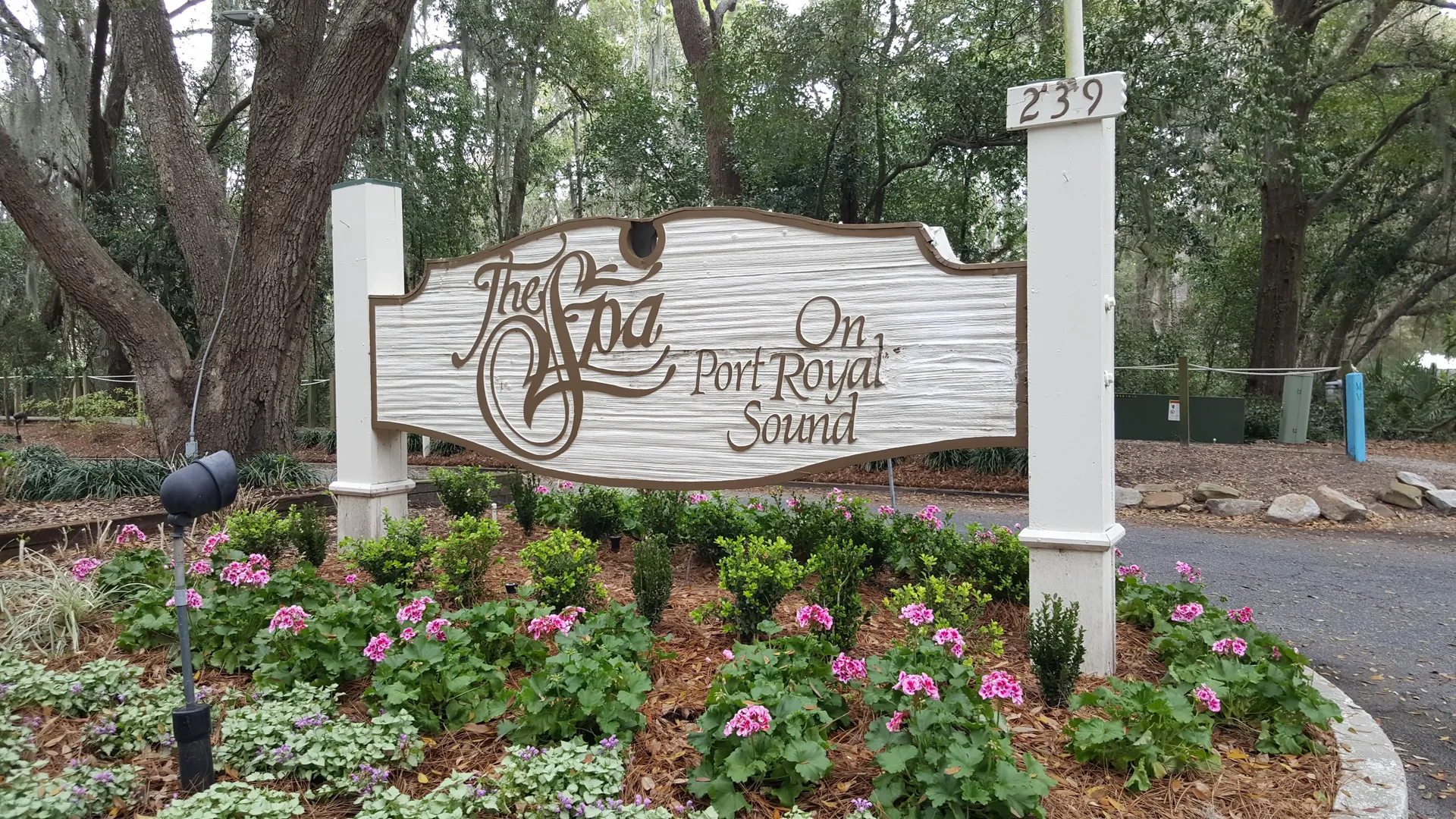 The Spa on Port Royal Sound entrance sign with pink flowers